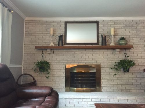 White-washed brick fireplace