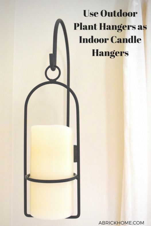 Use outdoor plant hangers for indoor candle hangers