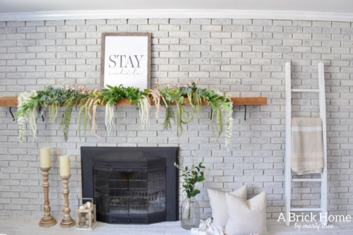 A Brick Home - spring mantel, floral spring mantel, spring mantel garland, spring mantel branches, spring mantel decorating ideas