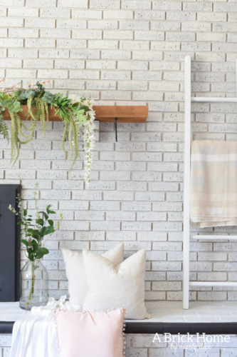 A Brick Home - spring mantel, floral spring mantel, spring mantel garland, spring mantel branches, spring mantel decorating ideas