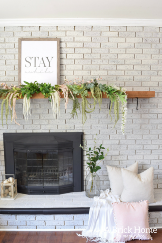A Brick Home - spring mantel, floral spring mantel, spring mantel garland, spring mantel branches, spring mantel decorating ideas