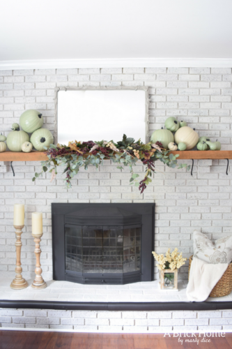 AWESOME Fall Mantel Blog Hop! Did you see this yet? I love the use of dollar store pumpkins and plum decor for the fall mantel! #fallmantel #falldecor #manteldecor