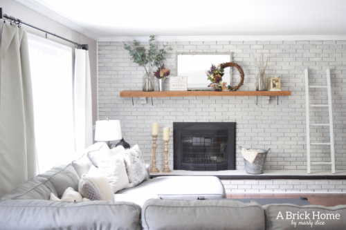 AWESOME Fall Mantel Blog Hop! Did you see this yet? I love the use of dollar store pumpkins and plum decor for the fall mantel! #fallmantel #falldecor #manteldecor