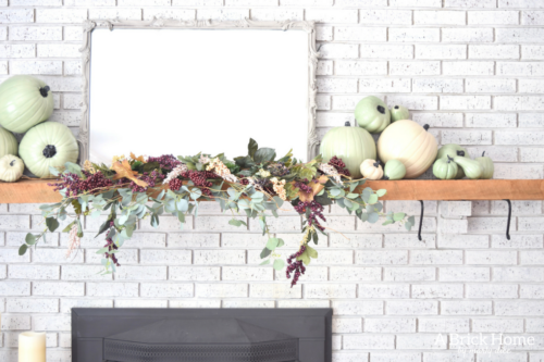 AWESOME Fall Mantel Blog Hop! Did you see this yet? I love the use of dollar store pumpkins and plum decor for the fall mantel! #fallmantel #falldecor #manteldecor