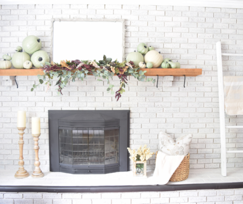 AWESOME Fall Mantel Blog Hop! Did you see this yet? I love the use of dollar store pumpkins and plum decor for the fall mantel! #fallmantel #falldecor #manteldecor