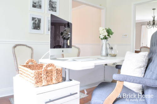 Wow! This feminine home office got a complete makeover! It's beautiful and functional - check out the complete tour. #officedecor #officedesign