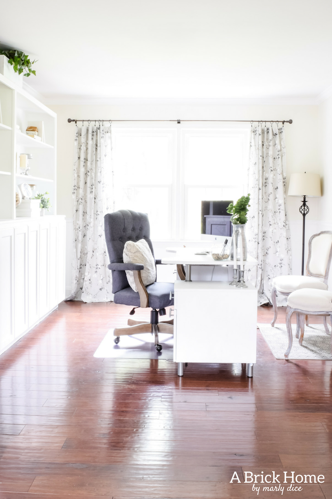 Wow! This feminine home office got a complete makeover! It's beautiful and functional - check out the complete tour. #officedecor #officedesign