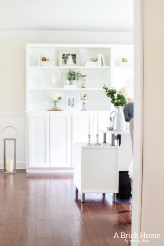 Wow! This feminine home office got a complete makeover! It's beautiful and functional - check out the complete tour. #officedecor #officedesign