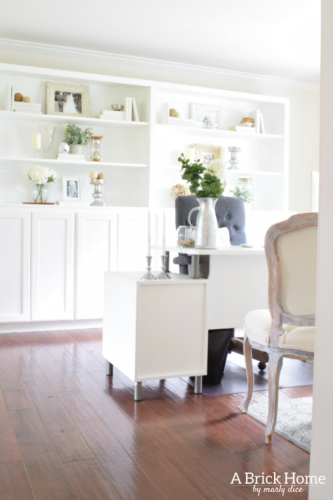 Wow! This feminine home office got a complete makeover! It's beautiful and functional - check out the complete tour. #officedecor #officedesign
