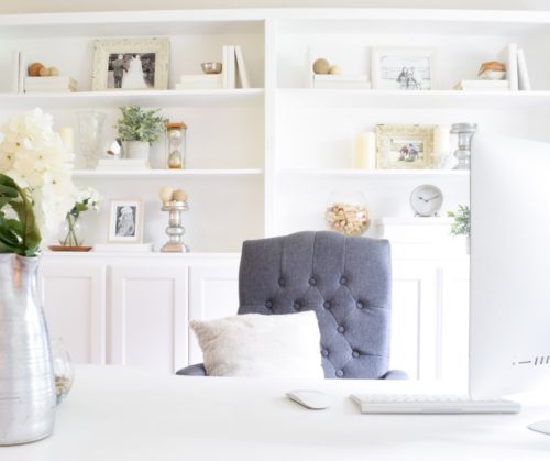 Wow! This feminine home office got a complete makeover! It's beautiful and functional - check out the complete tour. #officedecor #officedesign