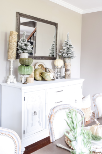 Gorgeous Dining Room Decked out in Transitional Fall to Winter Holiday Decor! A snowy tablescape with evergreens and pumpkins top off the almost Christmas decor look! #falldecor #winterdecor