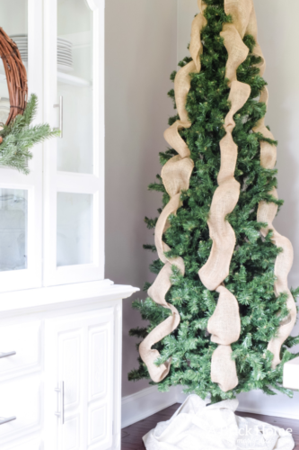 Gorgeous Dining Room Decked out in Transitional Fall to Winter Holiday Decor! A snowy tablescape with evergreens and pumpkins top off the almost Christmas decor look! #falldecor #winterdecor