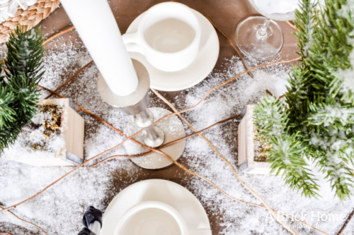 Gorgeous Dining Room Decked out in Transitional Fall to Winter Holiday Decor! A snowy tablescape with evergreens and pumpkins top off the almost Christmas decor look! #falldecor #winterdecor