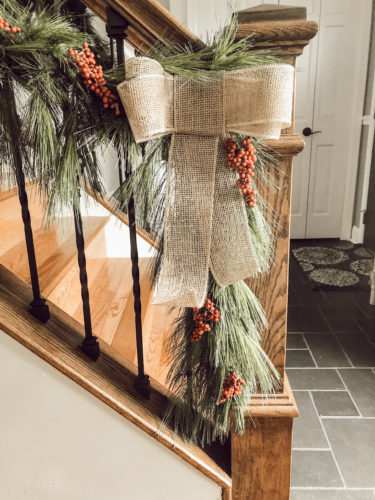 Obsessing over this DIY Christmas Garland! Learn how to make DIY Christmas Garland Using Simple Faux Garland and Real Pine Branches! #abrickhome #garland