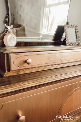 Such a sweet rose gold dresser makeover for a little girl. Gorgeous antique vanity dresser! #dressermakeover
