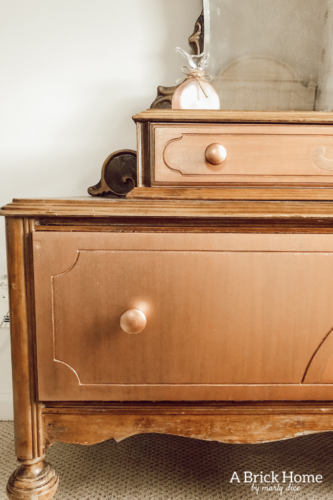 Such a sweet rose gold dresser makeover for a little girl. Gorgeous antique vanity dresser! #dressermakeover