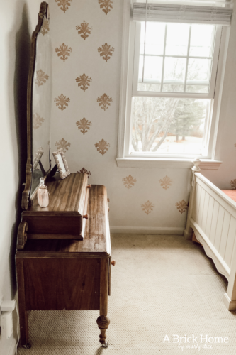 Such a sweet rose gold dresser makeover for a little girl. Gorgeous antique vanity dresser! #dressermakeover