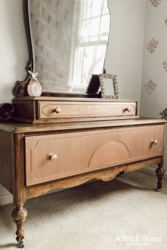 Such a sweet rose gold dresser makeover for a little girl. Gorgeous antique vanity dresser! #dressermakeover