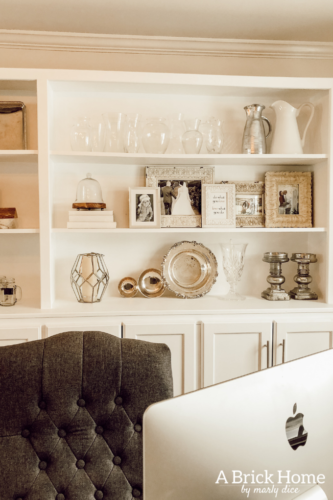 GENIUS tips for styling bookshelves with books and things you already own! #bookcasestyling