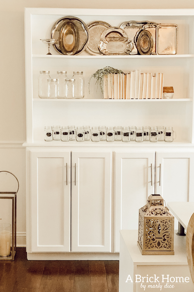 GENIUS tips for styling bookshelves with books and things you already own! #bookcasestyling