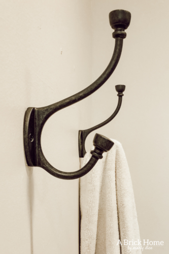 LOVING these towel hooks and the updated master bathroom space - A Brick Home #towelhooks
