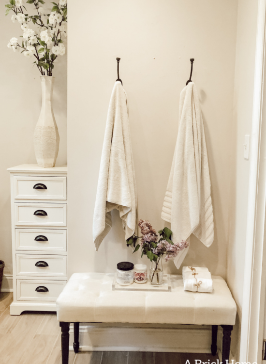 LOVING these towel hooks and the updated master bathroom space - A Brick Home #towelhooks