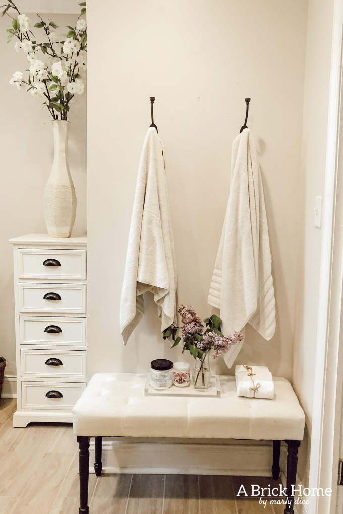 LOVING these towel hooks and the updated master bathroom space - A Brick Home #towelhooks