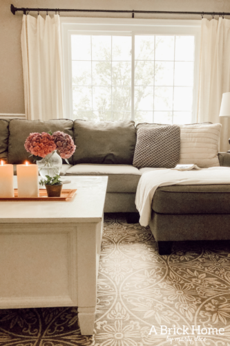 This Ashley Furniture sectional review is so honest and tells you EVERYTHING you need to know about it! #fabricsectional #ashleyfurniture #ashleyhomestore