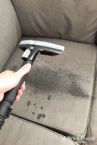 Marly uses THIS method to get stains and smells out her sectional. Learn how to really clean a fabric couch! #cleanafabriccouch #cleanupholstery