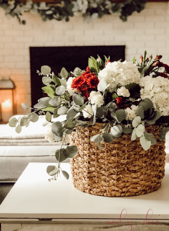 Learn how to make this fall flower arrangement in a basket using hydrangeas and eucalyptus! #fallflowerarrangment #basketofflowers #fallflowers