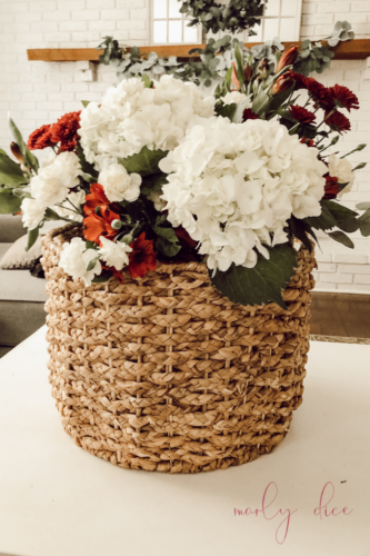 Learn how to make a fall flower arrangement in a basket using hydrangeas and eucalyptus! #fallflowerarrangment #basketofflowers #fallflowers