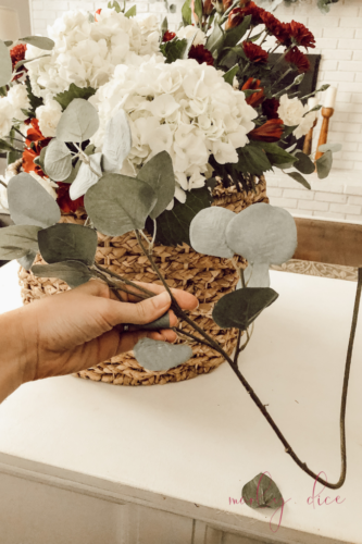 Learn how to make a fall flower arrangement in a basket using hydrangeas and eucalyptus! #fallflowerarrangment #basketofflowers #fallflowers