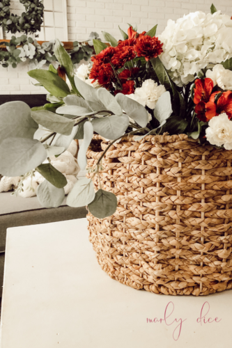 Learn how to make a fall flower arrangement in a basket using hydrangeas and eucalyptus! #fallflowerarrangment #basketofflowers #fallflowers