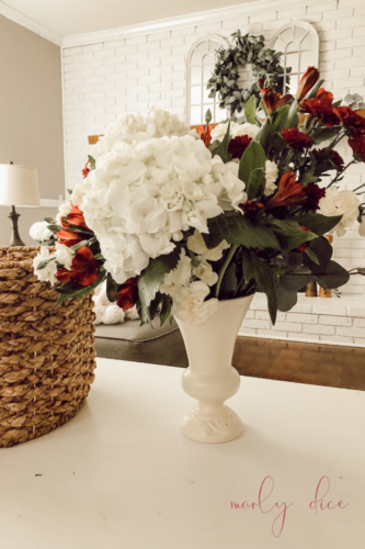 Learn how to make a fall flower arrangement in a basket using hydrangeas and eucalyptus! #fallflowerarrangment #basketofflowers #fallflowers
