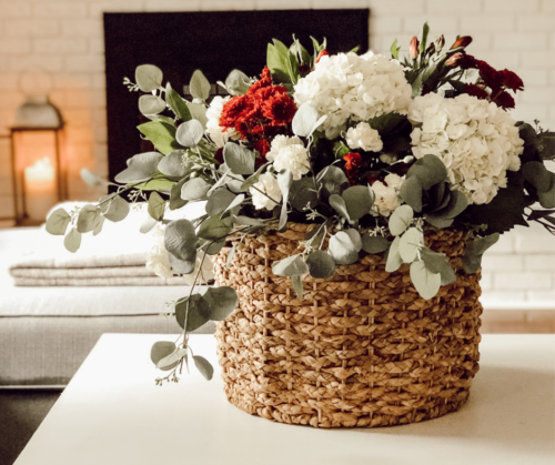 Learn how to make a fall flower arrangement in a basket using hydrangeas and eucalyptus! #fallflowerarrangment #basketofflowers #fallflowers