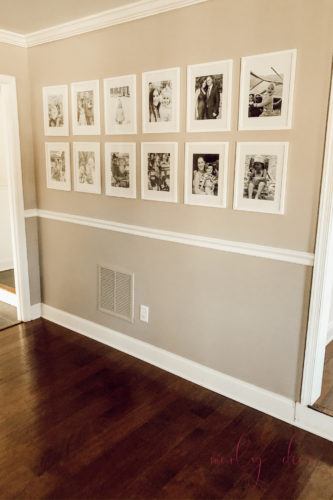 Make an even gallery wall the EASY way! These tricks & tips are genius!! #gallerywall #gallerywallideas