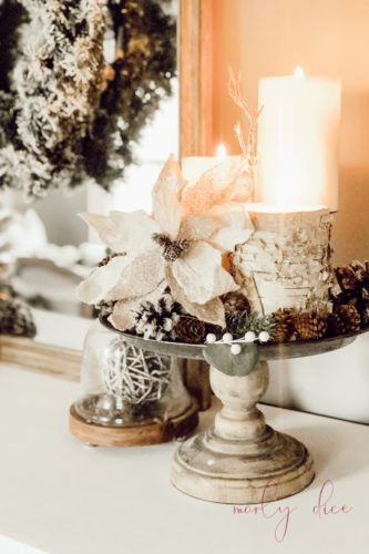 Loving this rustic winter tablescape and winter dining room decor! Beautiful use of eucalyptus and burlap together. #rusticwintertablescape #winterdecor #winterdiningroomdecor