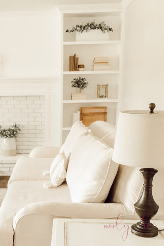 See how they fixed an off center fireplace in this gorgeous DIY fireplace makeover! #diyfireplacemakeover #offcenterfireplace #diyfireplacemantel