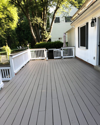 This DIY deck makeover is amazing!! Learn how they transformed their deck and the stain color they used! #deckmakeover