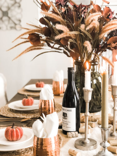 Obsessing over these gorgeous fall stems and moody fall decor on this tables cape! #falldecor #moodyfalldecor #falltablescape