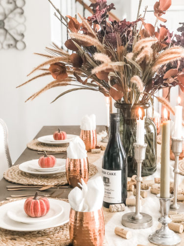 Obsessing over these gorgeous fall stems and moody fall decor on this tables cape! #falldecor #moodyfalldecor #falltablescape