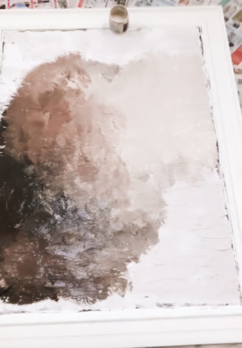 This textured DIY wall art is so easy to do!! See how she made texture over top an old painting and completely revamped it! #diywallart #diypainting