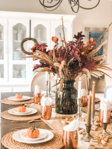 Obsessing over these gorgeous fall stems and moody fall decor on this tables cape! #falldecor #moodyfalldecor #falltablescape