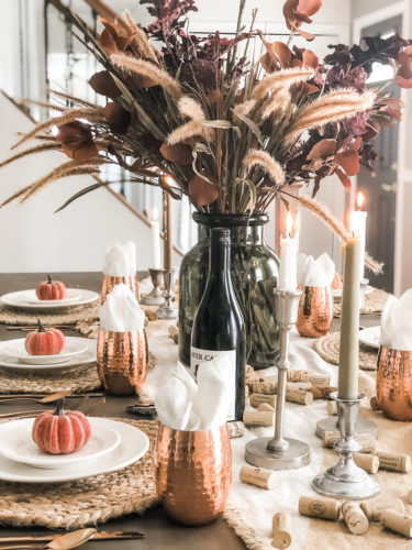 Obsessing over these gorgeous fall stems and moody fall decor on this tables cape! #falldecor #moodyfalldecor #falltablescape