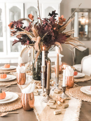 Obsessing over these gorgeous fall stems and moody fall decor on this tables cape! #falldecor #moodyfalldecor #falltablescape