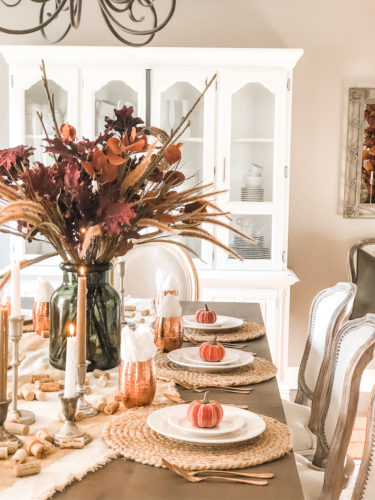 Obsessing over these gorgeous fall stems and moody fall decor on this tables cape! #falldecor #moodyfalldecor #falltablescape