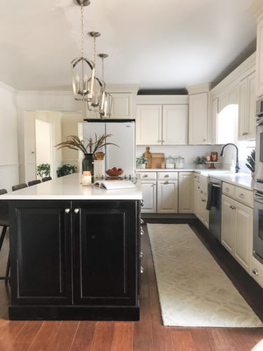 We swapped our granite for these gorgeous white quartz countertops and we LOVE them! #quartzcountertops