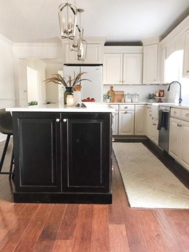 We swapped our granite for these gorgeous white quartz countertops and we LOVE them! #quartzcountertops