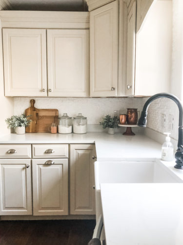 We swapped our granite for these gorgeous white quartz countertops and we LOVE them! #quartzcountertops