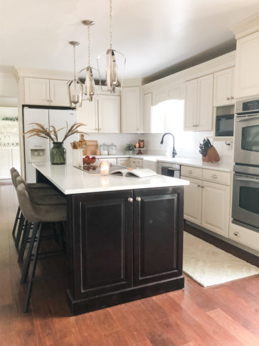 We swapped our granite for these gorgeous white quartz countertops and we LOVE them! #quartzcountertops